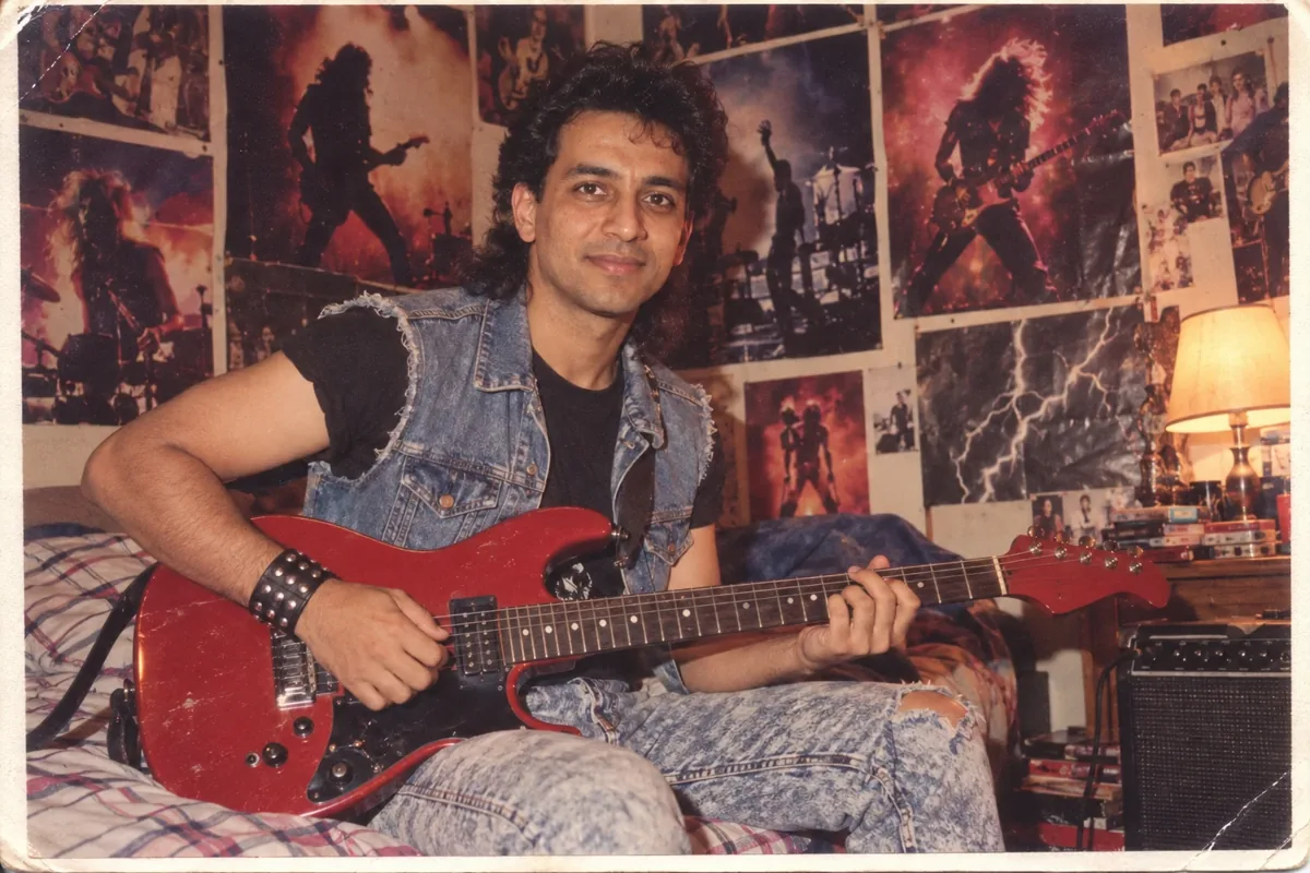 Rock Fan Bedroom With Guitar: a 1980s-style edit made with this prompt